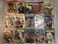 Overview of all 15 comics arranged in three rows showing front covers.