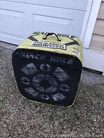 Front view of Black Hole square archery target showing target rings and bullseye with shooting marks.