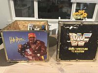 Full view of chest with Hulk Hogan graphic on one side and WWF logo on another side.