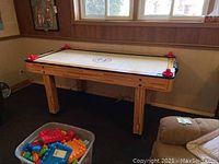 Full view of table in basement under window