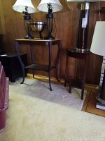 Full view of the larger wood end table with light top and curved legs, alongside the smaller dark wood table.