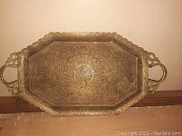 Full view of the solid brass etched tray showing the peacock design and decorative handles