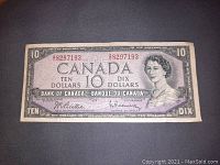 Front side of the 1954 Canadian 10 dollar bill showing Queen Elizabeth II portrait and serial numbers