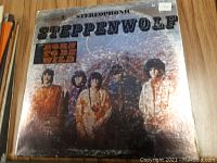 Photo of the Steppenwolf vinyl record album cover titled "Born to Be Wild" in stereo, showing band members and some wear on the cover.