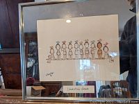 Full view of framed print showing artist signed print and title label