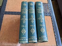 Spines of all three volumes showing gold embossed titles and publisher 'Bickers & Son'.