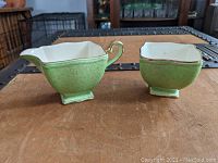 Green chintz Royal Winton Grimwades creamer and sugar bowl, front side view