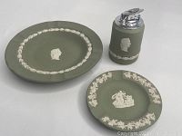 Full set showing lighter and two ashtrays on white background