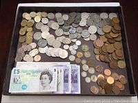 Tray of various British coins and banknotes