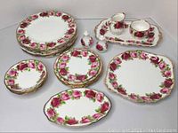 Full set arranged showing plates, bowls, shakers, jug and sugar bowl on tray