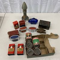 Overview of all coin banks arranged on table