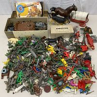 Overall lot layout showing boxed set, loose figures and large accessories