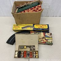 Overall lot with box, track set, curved pieces, pit kit box and parts case