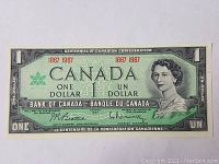 Front of the 1967 Canadian one dollar banknote showing Queen Elizabeth II and Centennial of Canadian Confederation design.