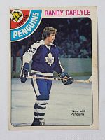 Front of 1978-79 O-Pee-Chee Randy Carlyle rookie card showing Carlyle in hockey uniform with Penguins and Maple Leafs mention.