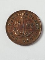 Reverse side of the 1944 Newfoundland one cent penny coin showing the year, denomination, and Newfoundland text