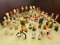 View of entire collection of vintage salt and pepper shakers featuring various animal and character designs.