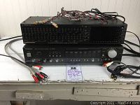 Both units stacked with cables and power cords connected