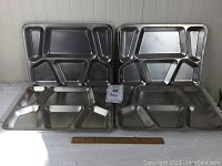 Four heavy duty aluminum 6-section mess trays shown together, each approx. 15.5 x 11.75 inches.