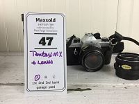 White MaxSold lot card with handwritten “Pentax MX + lenses” in front of camera and lens group.