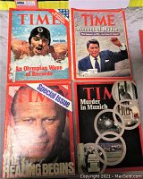 Four TIME magazines arranged in a grid. Covers show Mark Spitz swimming, Ronald Reagan, Gerald Ford, and Munich incident with Olympic rings.