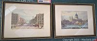 Two vintage framed prints shown side-by-side; the left depicts Regent Street, London; the right depicts St. Paul's Cathedral from the river.