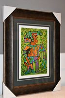 Framed art print shown in brown frame with matting, corner protectors still on frame.