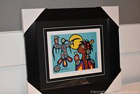 Full view of framed artwork with protective corner guards