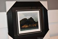 Overall view of the framed and matted  "Hills in Autumn" art print by AJ Casson with corner protectors on frame.