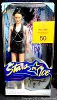 Front view of Kristi Yamaguchi Stars on Ice doll in sealed display box with label on front.