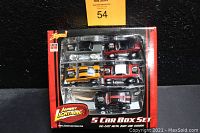 Front view of limited edition Johnny Lightning Zingers 5 car die-cast set in original packaging showing detailed models and branding.