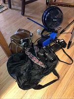 Overview of all items including cameras, bags, fan and tripod