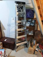 Full view of the folded 6ft aluminum ladder showing design and height