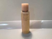 Front view of Shiseido bottle showing brand, product line, and product name on the label