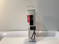 Front view of retail box showing Joby GorillaPod 325 branding and image of tripod with wrapping legs mounting camera.