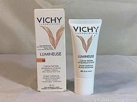 Full view of Vichy Lumineuse tinted moisturizer tube with matching box showing front of packaging and product.