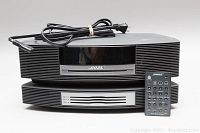 Front view showing Wave system, CD changer, power cord and remote