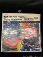 Front cover of The Moody Blues 'Days of Future Passed' LP vinyl album, Japanese pressing with colorful abstract artwork and album information
