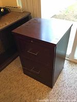 Top-side view of the two drawer file cabinet showing its overall condition and finish.