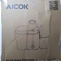 Picture of the original packaging box showing Aicok branding and juicer illustration.