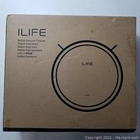 Closed cardboard box with ILIFE branding and line drawing of robotic vacuum.