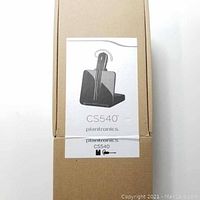 Cardboard box labeled Plantronics CS540 with image of headset charging base