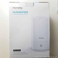 Front view of the humidifier box showing brand, model, and key features such as 4.5L capacity and top handle design.