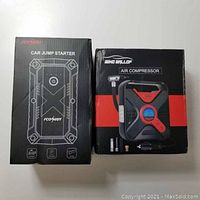 Boxed FCONGEY FC200 car jump starter and Wind Gallof air compressor tire inflator side-by-side