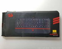 Box of Redragon Kardra 2 keyboard showing model name and brand logo.