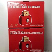 Box of the Connor McDavid themed toaster with red packaging and image of toaster and toast with player face imprint.
