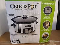 Box of Crock-Pot Original Slow Cooker showing product features and branding.