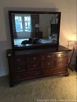 Full front view of dresser with attached mirror