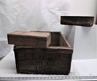 Wooden crates showing overall condition, size, and lid placement