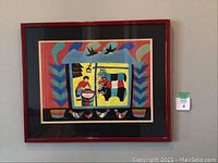 Frontal photo showing the full framed painting with stylized Chinese folk art scene including person, animals, and plants.